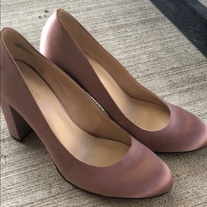 Pink satin pumps
